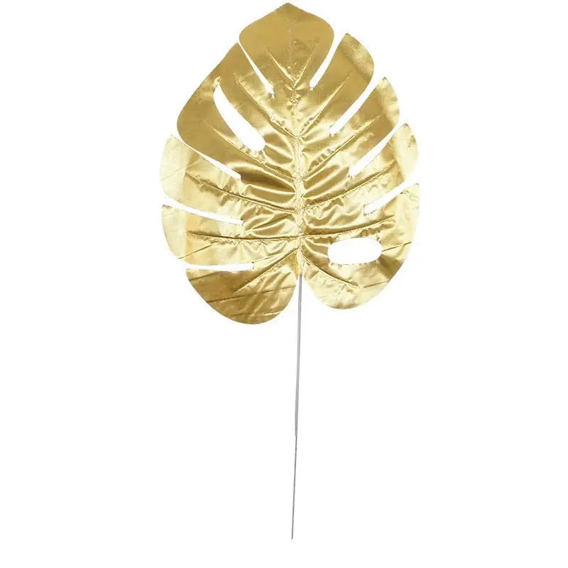 5 golden Monstera leaves