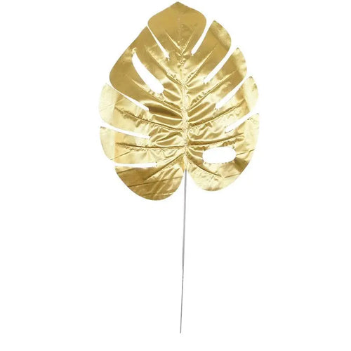5 golden Monstera leaves