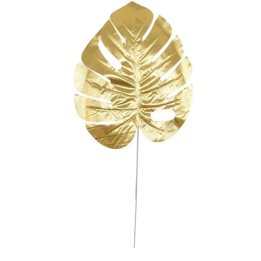 5 golden Monstera leaves